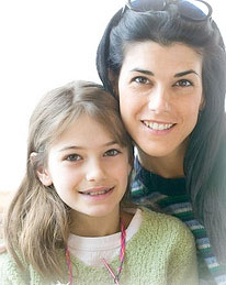 mother and daughter smiling